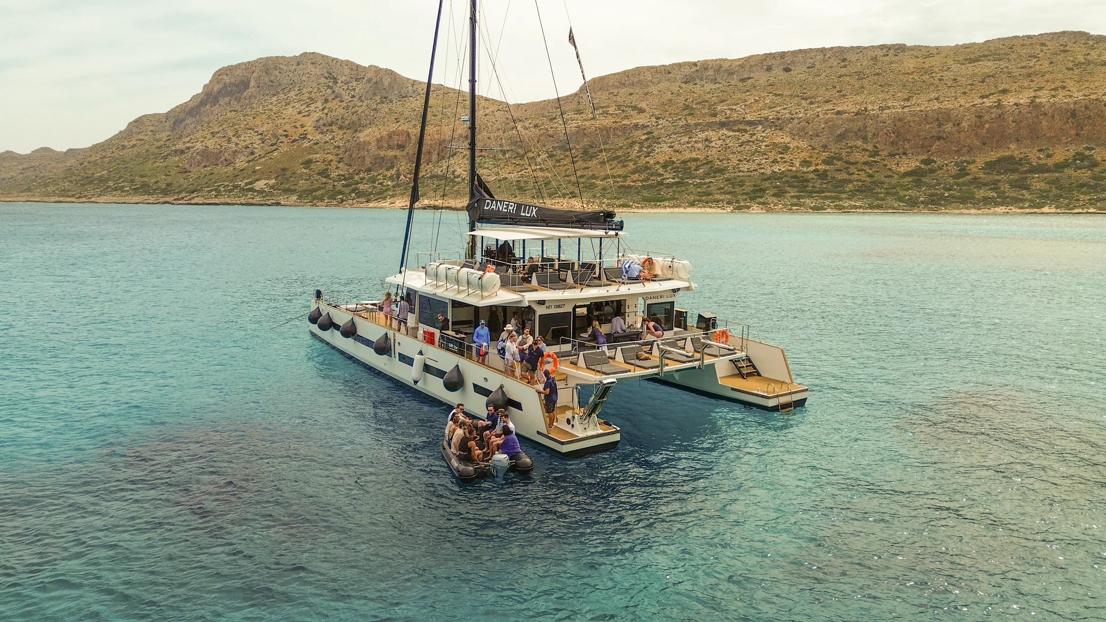 DanEri Lux catamaran welcoming guests near Kissamos