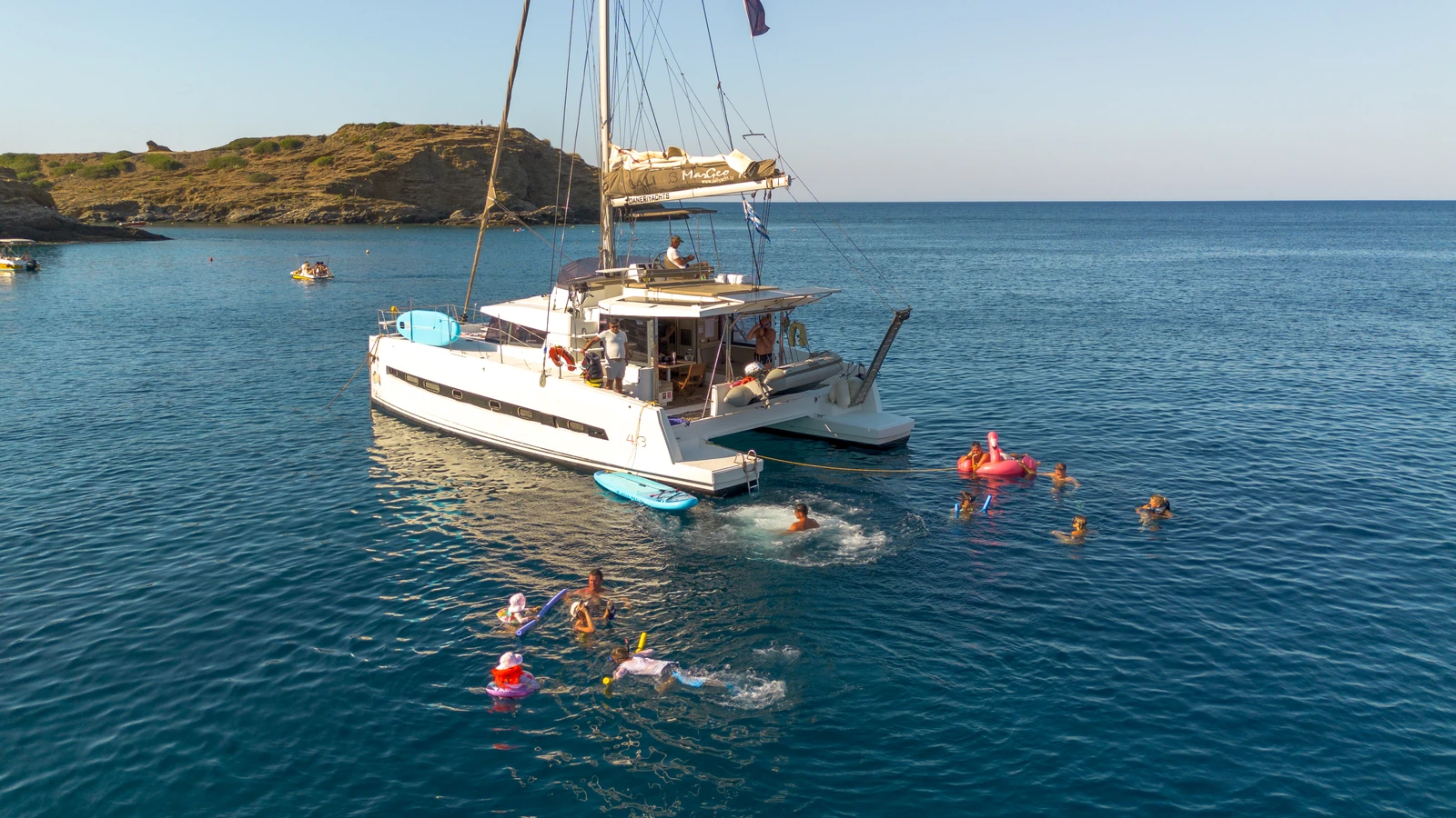 Luxury catamaran sailing from Panormo along the Bali Bay coastline